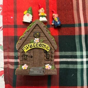Charming Brown Welcome House with Gnomes